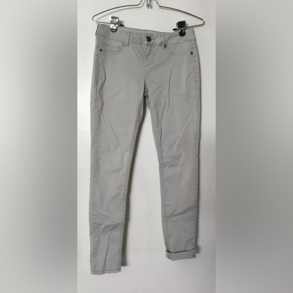 Off-white pants, stretch denim.